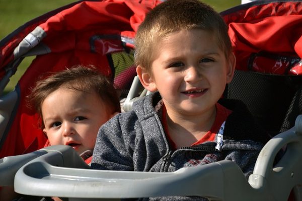 LIttle kids enjoying their double stroller