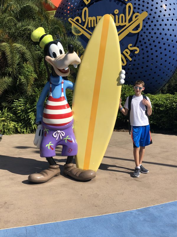 Posing with Goofy at Disney's Pop Century