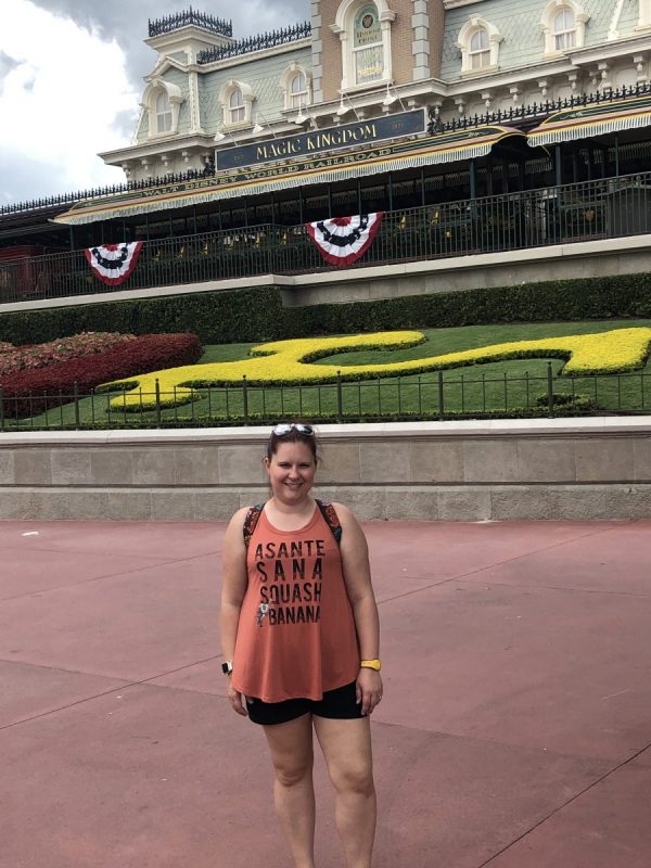 Standing outside Magic Kingdom, in front of the train station