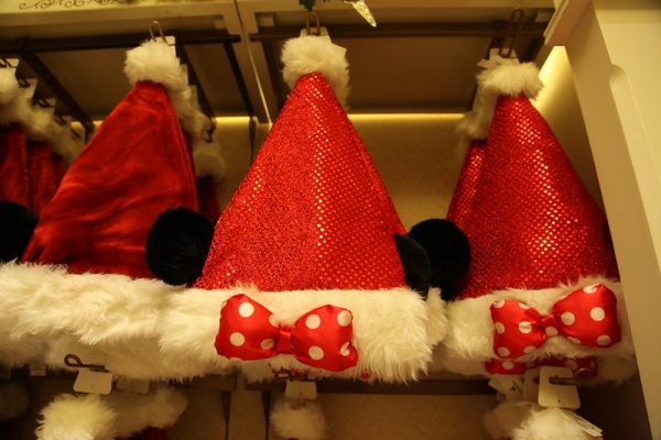 Minnie Mouse Santa Hats hanging in a Christmas Display