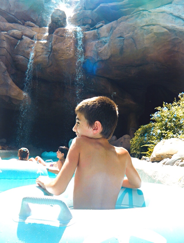 Boy riding in a tube in Disney's Typhoon Lagoon