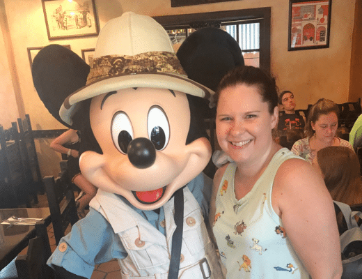 Photo of woman and Mickey Mouse at Tusker House restaurant in Animal Kingdom theme park at Walt Disney World