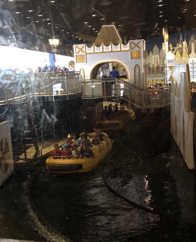 View of It's A Small World from inside Pinocchio's Village Haus