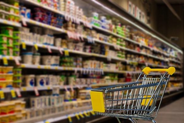 A small cart sitting in the grocery store