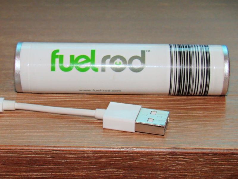 Fuelrod sitting on a desk with its included adapter