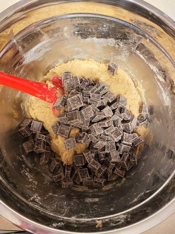 Belgian Semi-Sweet Chocolate Chunks sitting on top of raw cookie dough