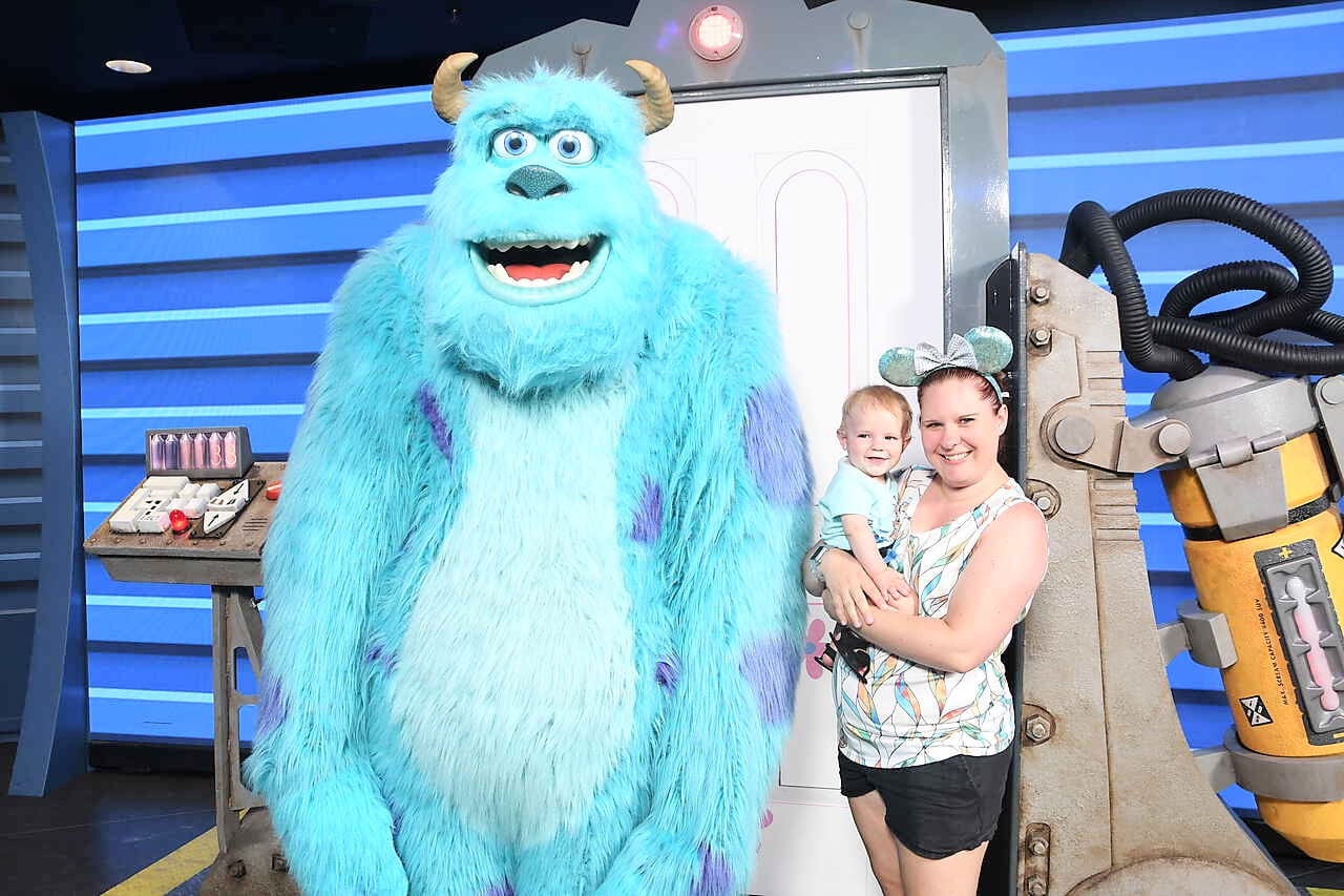 Baby meeting Sully, from Monster's Inc, in Hollywood Studios at Walt Disney World