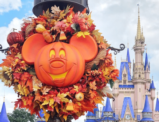 Halloween wreath with Cinderella Castle in the background, in Magic Kingdom.