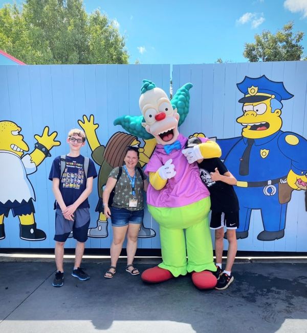 Mom and boys with Krusty the Clown in Universal Studios Orlando