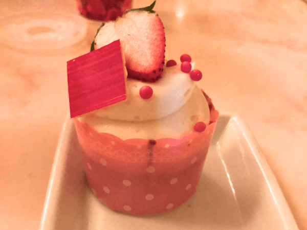 A strawberry cupcake from Be Our Guest in Walt Disney World (Magic Kingdom)