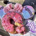 A Travel Agent Mickey ears with a broken donut